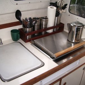 spice/utensil rack and cutting board