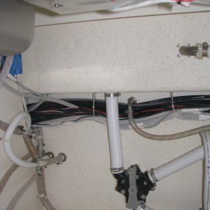 Under Galley Cabinet, on TomCat
