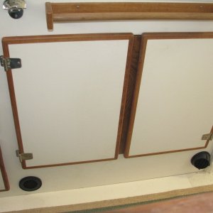 Media 'Cold air return on left, hot air outlet on right, it rotates to direct airflow.  A new door divider was screwed to the back of the right hand door to close the gap.' in album 'Under Galley Cabinet, on TomCat'