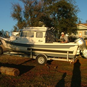 Dad hooking up Cannon Downrigger.