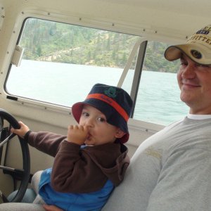 Giving Daddy boating lessons.