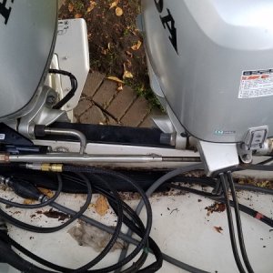 Media 'Existing tie bar repurposed from mechanical steering system. STBD engine was temporarily lifted for clearance and the mechanical steering cut for removal.' in album 'Master 2003 Honda BF503 steering bracket for Baystar HC4645-3 ram and HH4315-3 tilt helm'