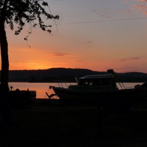 Sunrise camped alongside the Mississippi River south of Dubuque, Iowa.  River low, fields dieing due to drout.