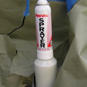 Media 'The Preval sprayer w/ thinned gelcoat w/ speed cure.' in album 'Grinding away the gelcoat.  Note the pink foam core.'