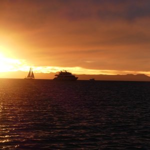 Sailors sunset sail.