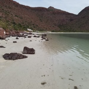 The beautiful long soft white sand beach in Ensenada Partita bay.
