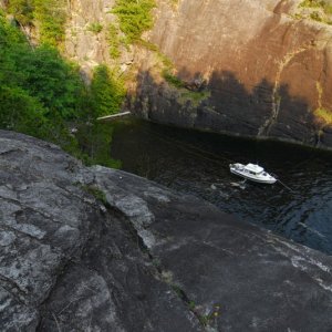 Anchored beneath the waterfall at Teakerne Arm