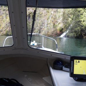 Media 'If you look at the Lowrance, you can see that the "chart" of the lake ends and I'm now on dry land north of the skinny tip of the lake.  When the lake is full it continues for another half mile beyond the chart into a deep canyon.  Ignore the depth reading of 1.8 feet.  The canyon is so steep and narrow that the depth sounder didn't work.' in album 'Lake Kokanee boat launch right next to the dam and power house'