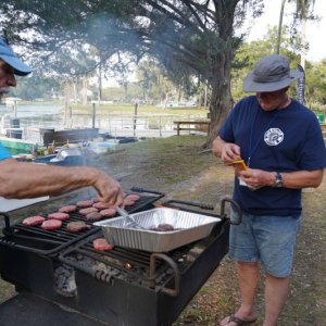 Flipping Burgers and hot dogs for dinner