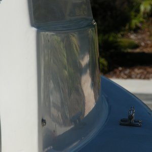 Media 'Starboard polished ready for decal' in album '11 transom screws or former screws sealed with adhesive sealant were removed, properly filled, and a gelcoat patch kit applied.  Color matching of the kit was definitely off.'