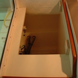 The second modification involved raising a portion of the locker to accomodate a microwave (so the microwave door could open).