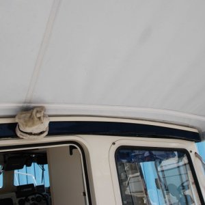 Zipper option to camper top

I really need to wash that sock cover on the backup camera.