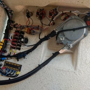 Cleaned up all the wiring behind the console. There was lamp cord being used for the horn and a couple circuits, like the stereo circuit, that weren't being used so, I got rid of them. Much cleaner now.