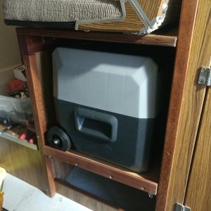 Got the fridge shelf installed today. Easy galley access under the helm seat.

This will pretty much be used for food only. Drinks will be in the cooler in the cockpit like we have done all along. Well, until we run out of ice anyway.