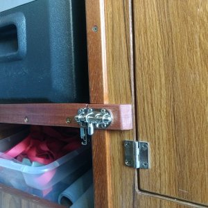 Media 'While I doubt the fridge shelf would slide out on it's own I added this spiffy little slide bolt latch to secure it while underway, "just in case".' in album 'Then I pulled this destroyer wheel from the fishing boat, wrapped it with some 550 Paracord, and installed it in the Dory. Nice little update from the "vintage" plastic wheel.'