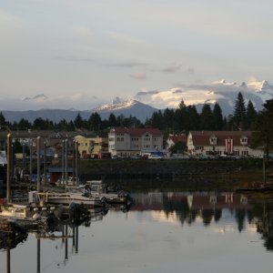 Inside Passage 2011 204 -Petersburg S Harbor, Town, Sons of Norway Hall, BC Mts in background. Note the C-Dory 16.
