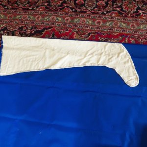 This is my pattern (made out of an old sheet) on top of the waterproof material.  The material is left over from making dry bags from my kayaking days.