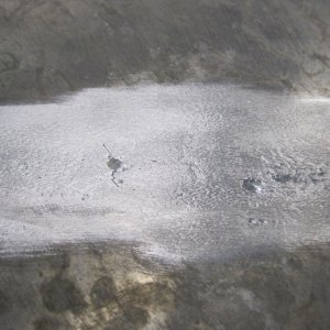 Media 'Pitting close up' in album 'Bottom of tank showing corrosion line that was sitting on raised floor.'