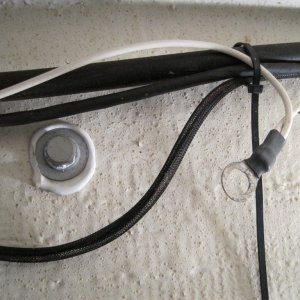 Media 'Forgotten gas tank grounding lug.' in album 'Bottom of tank showing corrosion line that was sitting on raised floor.'