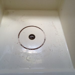 Media 'I made the cut in several passes, lowering the bit each time.' in album 'The problem: Under the plastic cap there\'s water in the space below the cabin floor, and the foam is soaked. An access port will be needed.'
