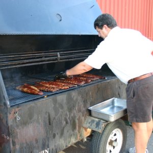 The Master griller doing ribs for the party Sat night. He\'s also a local favorite.