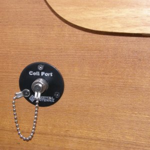 Media 'Cell phone amplifier, works for laptop aircard too' in album 'Added liner inside portside cock pit storage to protect wiring, etc. Shown is outboard motor mount for swim step'