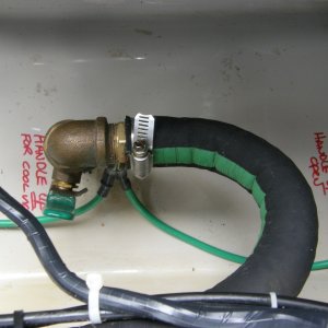 Media 'Marked the intake valves to avoid costly mistakes,' in album 'Added liner inside portside cock pit storage to protect wiring, etc. Shown is outboard motor mount for swim step'