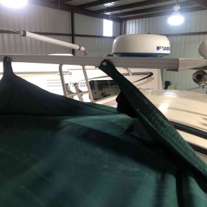 Installed snaps to solar panel to hold bimini back for easy entry to boat when docked. 1