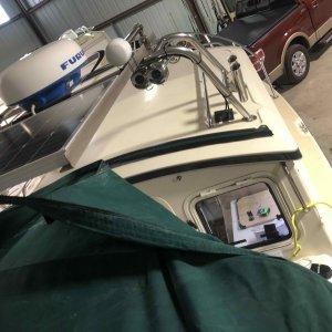 Installed snaps to solar panel to hold bimini back for easy entry to boat when docked. 2