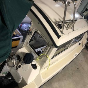 Installed snaps to solar panel to hold bimini back for easy entry to boat when docked. 3