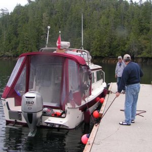 Dave and Alan Olson securing Daydream on float at Pruth Bay 6-13-06