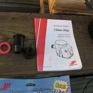 Ultima bilge pump, opened package, includes all parts and instructions, package insert.