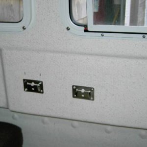 Extra table brackets to hold seat in standard position and aft position. Only two of us and I didn't want to cut table or loose drawer under top.