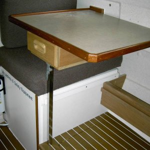 Table in aft position over the top of the rear seat. This setup blocks use of the rear seat when the Barber Chair faces forward.