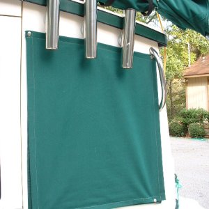 Sunbrella cabin window covers for privacy and shade. Also keep the windows clean. These covers snap to the mesh shades under them.