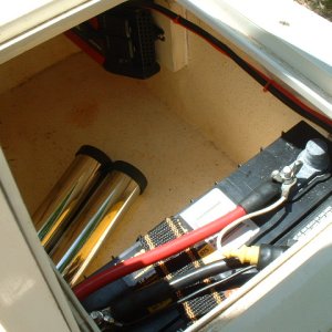 I moved the house battery to the livewell, since we never use it anyway. Also moved the inverter to the rear of this space.