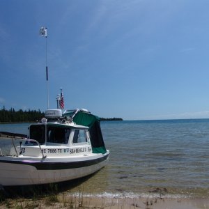 Watch for rocks. Walk your boat in.