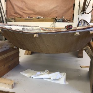 I used 1/8" smooth masonite to make a curved form section to close the front of the roof.