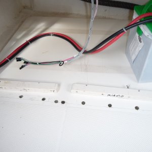 4. Starboard side ready to reinstall hardware. 
There was some air bubbles, shrinkage or seapage of the epoxy into the foam core, so it took two applications of epoxy.