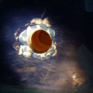 14. Can you see inside the Dremeled out hole? Past the 3/8" hole in the outside layer of fiberglass, you should be able to see how the inside of the hole is larger in order to hold more epoxy and seperate the fastener in epoxy from the core.