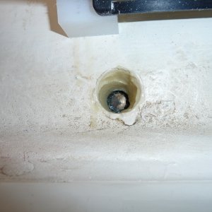 5. Inside of drain plug hole filled in with epoxy. Drain plug in place.