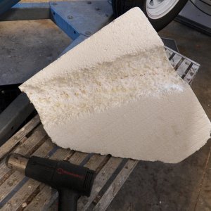 Because of the new hawse pipe, the original EPS needed to be modified.  Cutting EPS is generally really messy.  So I used my heat gun (and adequate ventilation).
