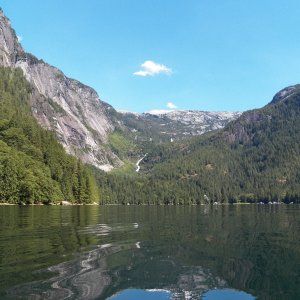 The head of the inlet showing the top of Chatterbox Falls and the public pier on the right.