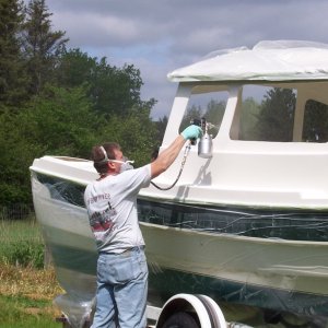 Spraying new paint over Epoxy primer.