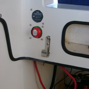 Switch and voltage sensative relay in the holes.  Doesn't quite work