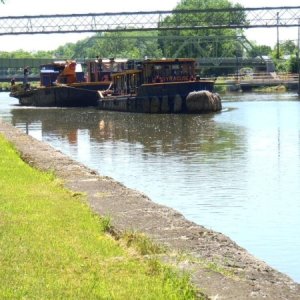 23.) The famous Syracuse tug pulling the barge with the tree trimming crew.