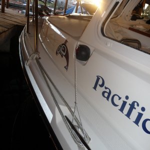 Media 'Forward Hatch Cover.
Stretch cord back to midship cleat' in album 'Forward Hatch Cover - red side bungies missing'