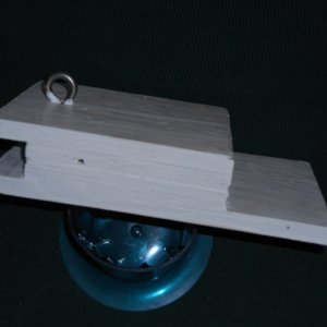 I wanted a way to mount the dinghy ob motor without drilling holes in the fiberglass.  This bracket slips in between the transom and rail and is secured by the ob motor mounts.