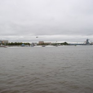 (Minnow) Start of the first race. Battleship NJ in background.