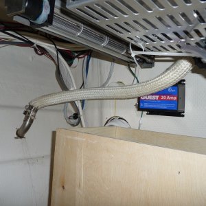 6. The original exhaust connection leaked an intolerable amount of water into the bildge and kept getting everything stored under the sink wet all the time.